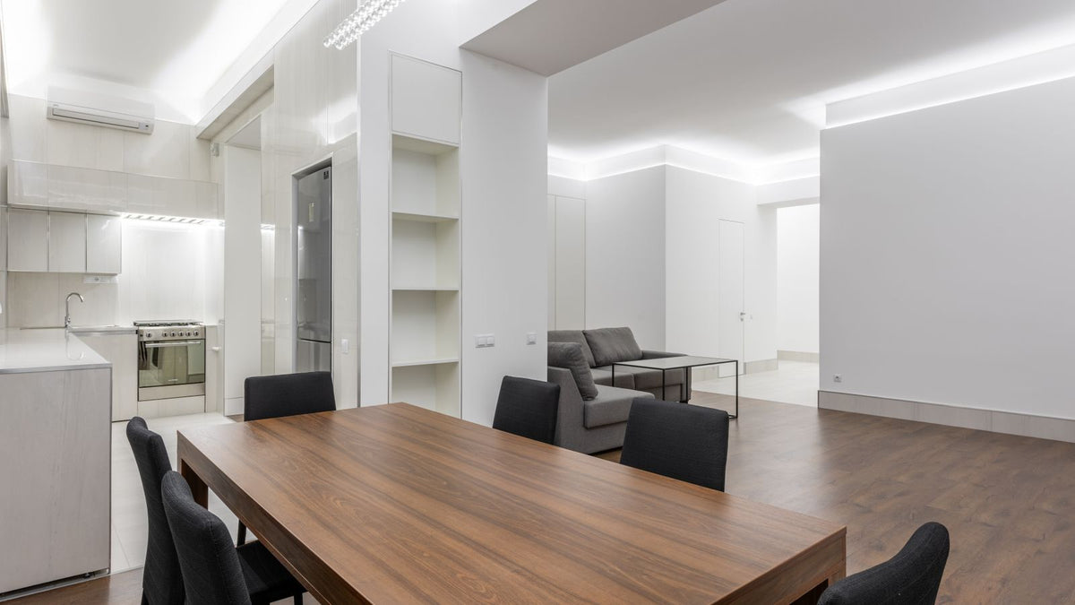 Salle à manger et salon modernes éclairés par des luminaires LED
