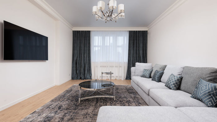 Fixer un lustre lourd au plafond : placo, béton, hourdis ou bois