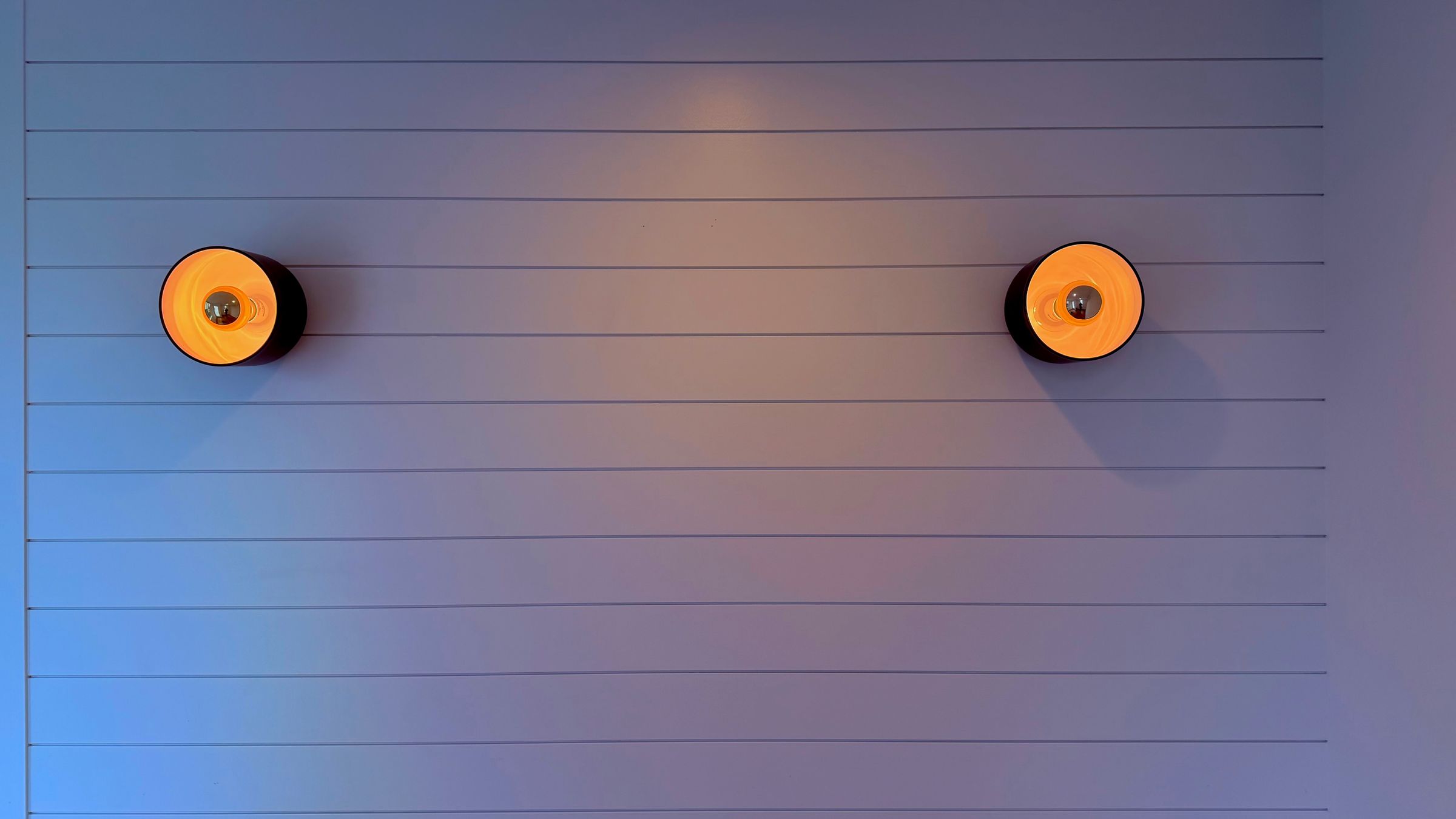 Appliques murales design allumées — collection Lumiverra