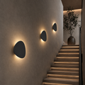Appliques galet noires dans une montee d escalier #noir
