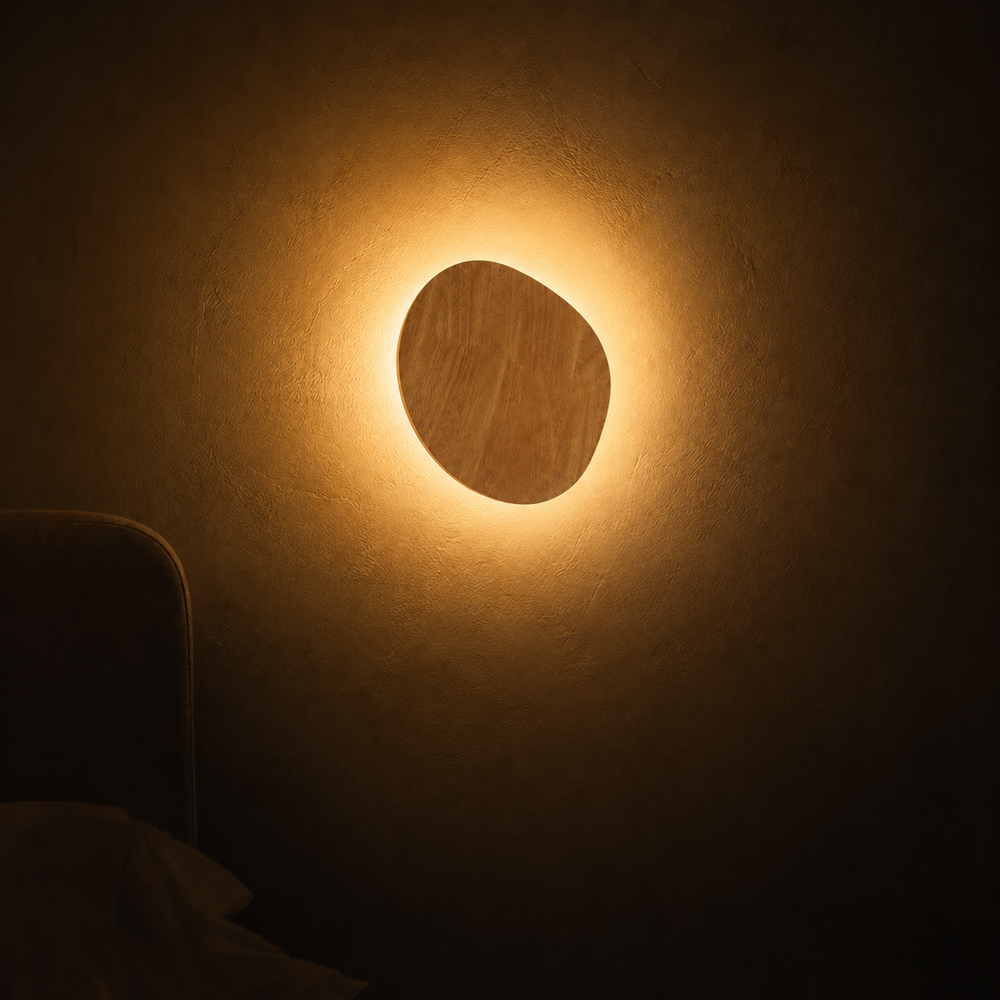 Applique galet seule source de lumière la nuit, halo doux sur le mur #ovale
